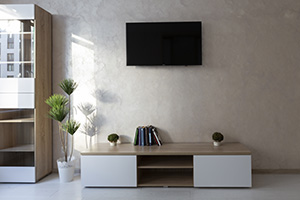 Furniture of a living room: TV, armoir and press