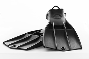 Isolated black professional diving fins on a white background